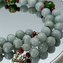 Load and play video in Gallery viewer, Pair of Carved Certified Jadeite Foo Dogs with Double Strand Jadeite Necklace
