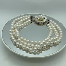 Load and play video in Gallery viewer, Swarovski Triple Strand Pearl Necklace
